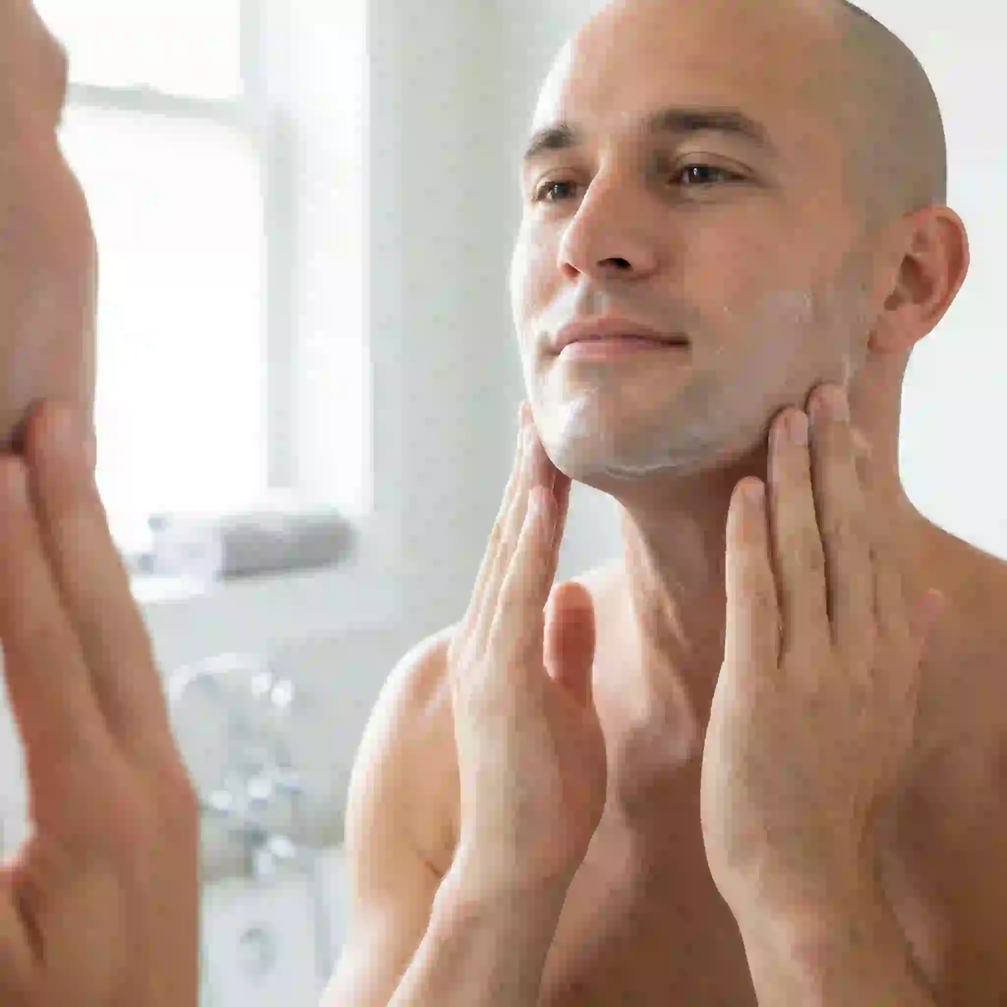 pressing gently to absorb best aftershave balm for sensitive skin