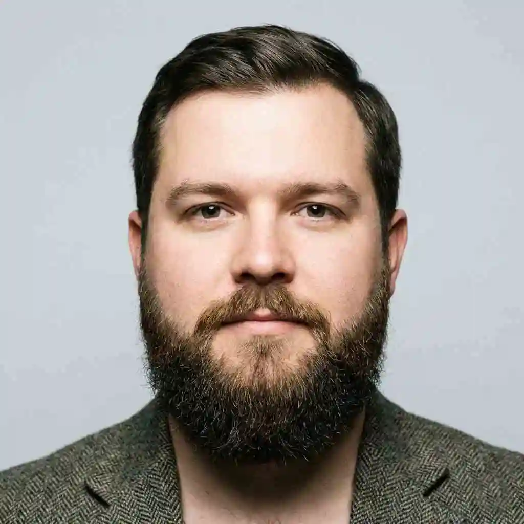 This image displays the Garibaldi Lite, a shorter version of the full beard that maintains a rounded bottom while adding chin length, serving as a friendly entry-level best beard for round face.