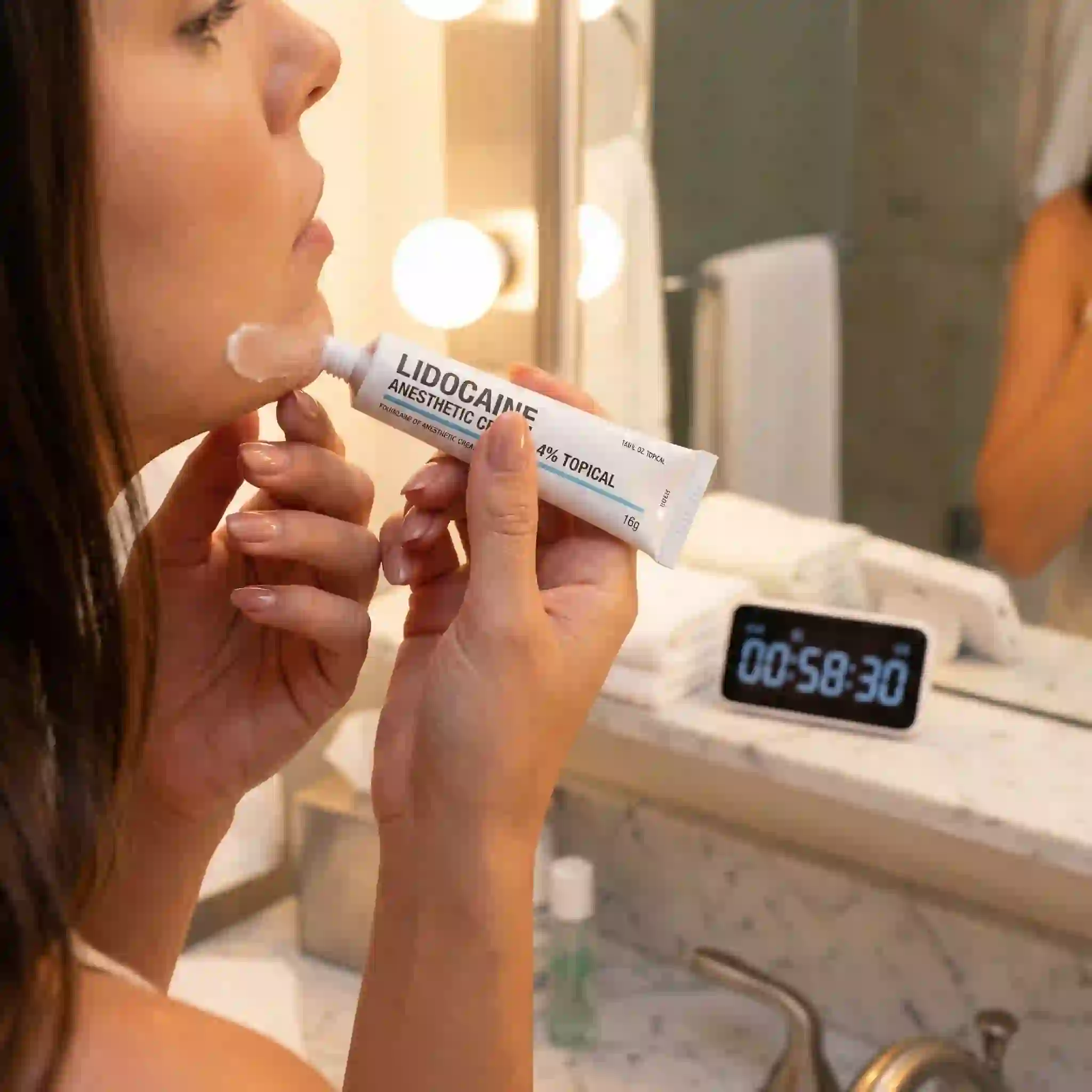 Proper application of topical numbing cream to the treatment area to significantly reduce discomfort and manage pain effectively during a rigorous and meticulous professional beard electrolysis hair removal session.