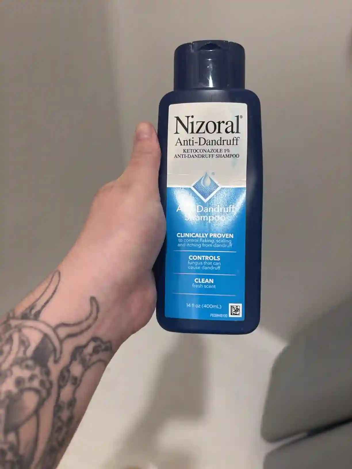 beard dandruff shampoo review image featuring Nizoral as a ketoconazole option for moderate to severe flakes caused by fungal overgrowth