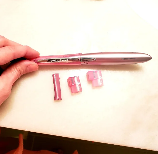 best face shaver for women dealing with coarse hair, featuring a pivoting precision trimmer for chin, upper lip, eyebrow shaping, and stubborn facial strands.