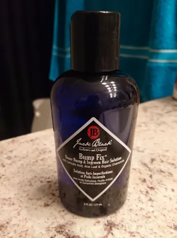 Multi-acid treatment photo for how to get rid of razor bumps with Jack Black Bump Fix, featuring pore-clearing exfoliation, soothing botanicals, and versatile use on face and neck.