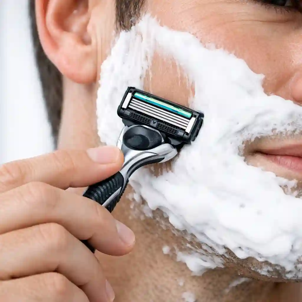 Correct razor pressure guide showing how to let razor weight do the work to avoid razor burn and skin irritation