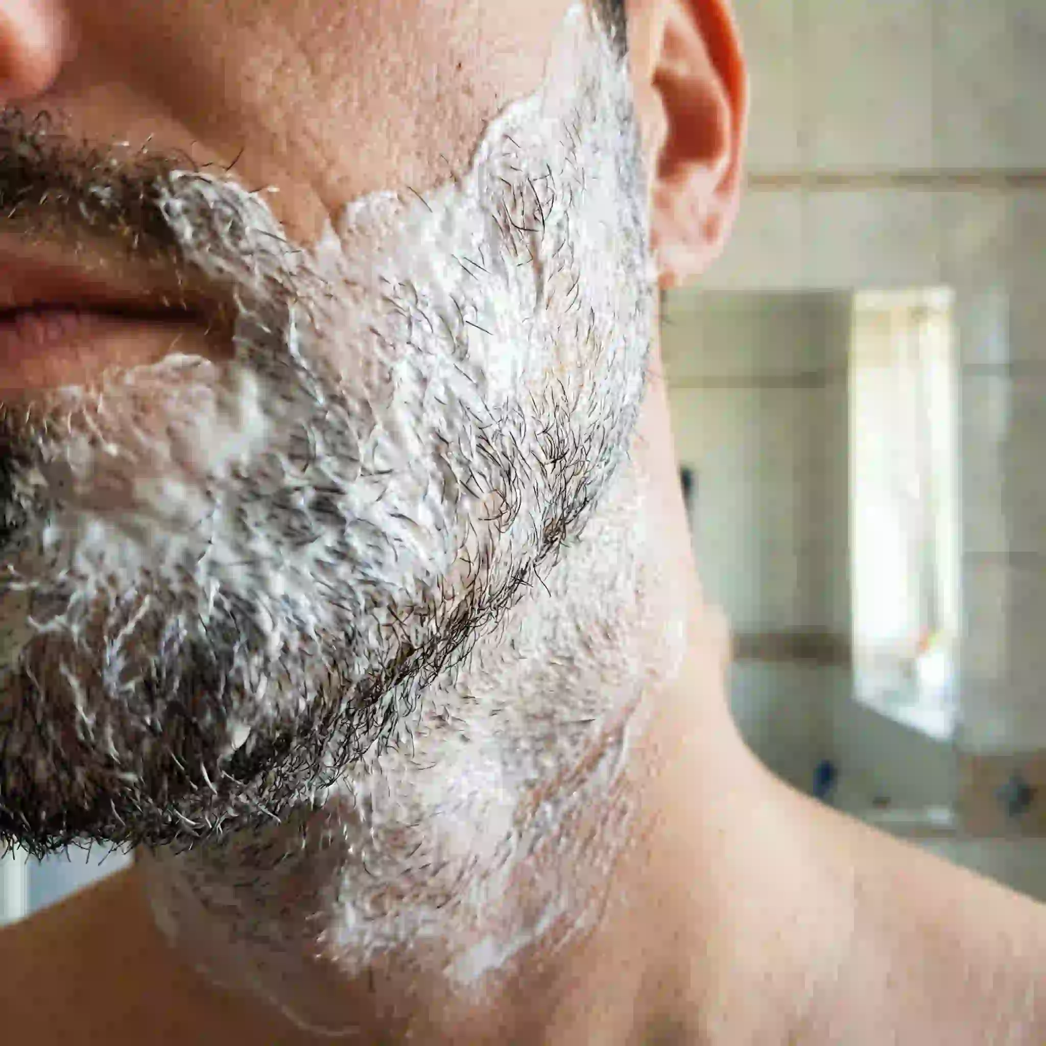Depilatory beard removal cream showing how thioglycolic acid breaks down keratin bonds to dissolve facial hair